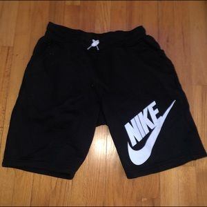 Black Nike shorts.